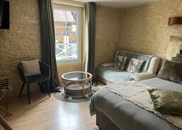 Alojamento de Acomodação e Pequeno-almoço D’hôtes De L’ancienne Thaon